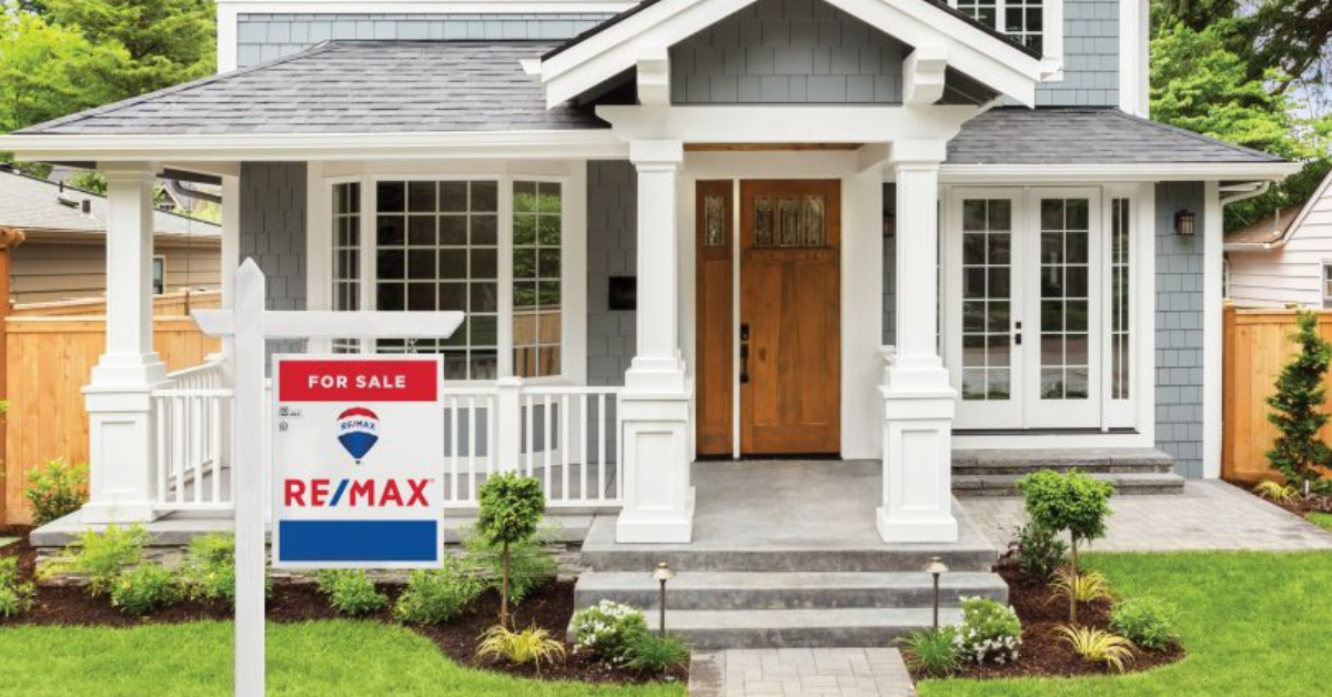 Remax For Sale Sign in front of single family home for sale in Kamloops BC